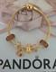 Genuine Pandora Bracelet Gold + 6 Pandora Lion King. Charms 20 Cm Ale Met Rp £500