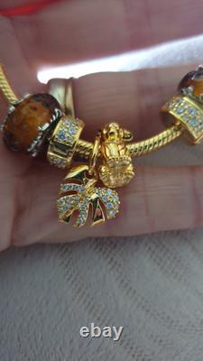 GENUINE PANDORA BRACELET Gold + 6 PANDORA LION KING. CHARMS 20 cm ALE MET RP £500