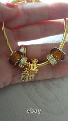 GENUINE PANDORA BRACELET Gold + 6 PANDORA LION KING. CHARMS 20 cm ALE MET RP £500