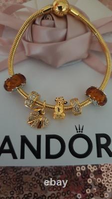 GENUINE PANDORA BRACELET Gold + 6 PANDORA LION KING. CHARMS 20 cm ALE MET RP £500