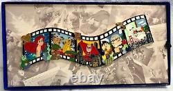 Disney DSSH film strip super jumbo pin LE 200 Ariel Incredibles Lion King Baymax <br/>   
  
<br/>
 
La traduction en français est : Disney DSSH Film Strip Super Jumbo Pin LE 200 Ariel Incroyable Lion King Baymax