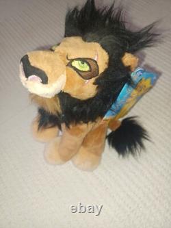 La figurine en céramique Scar du Roi Lion Disney, collectionnable, 5,5 x 3,5 pouces, DVD et peluche.