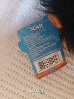 La figurine en céramique Scar du Roi Lion Disney, collectionnable, 5,5 x 3,5 pouces, DVD et peluche.