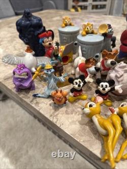 Lot de figurines Disney vintage des années 1990-2000 : Toy Story, Le Roi Lion, Aladdin, et plus.