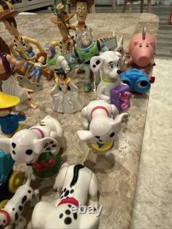 Lot de figurines Disney vintage des années 1990-2000 : Toy Story, Le Roi Lion, Aladdin, et plus.