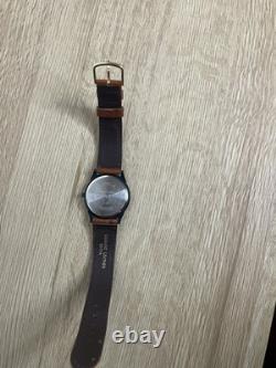 Montre Timex rare Le Roi Lion de Disney Timon et Pumbaa avec bracelet en cuir, état quasi neuf (EUC)